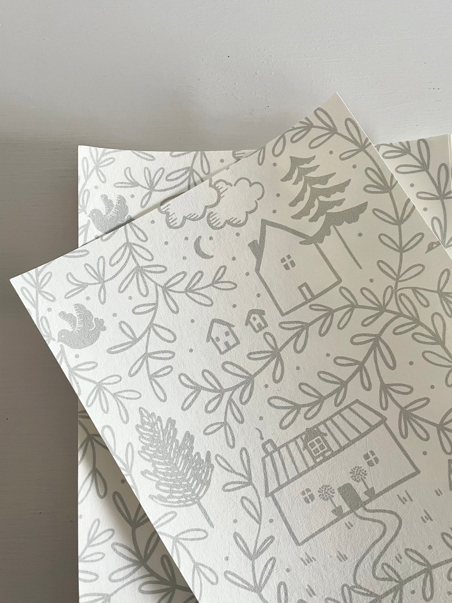 A5 Sample of Ducks In A Row Cottages in the Woods Kids wallpaper design in the colour way Pebble