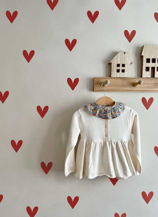Girls bedroom with red love heart fabric wall stickers, hooks, girls top
