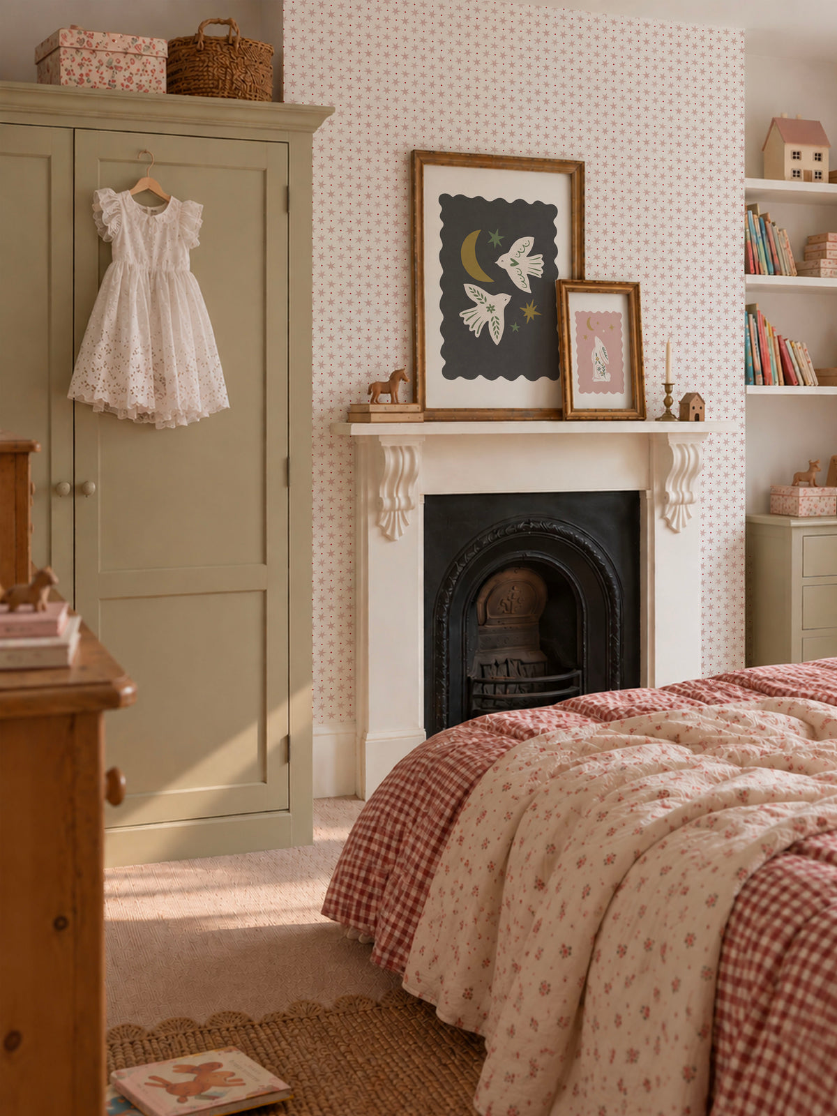 Ducks In A Row Stars & Spots Blush Wallpaper in girls bedroom with fireplace, gingham bedding, painted furniture 