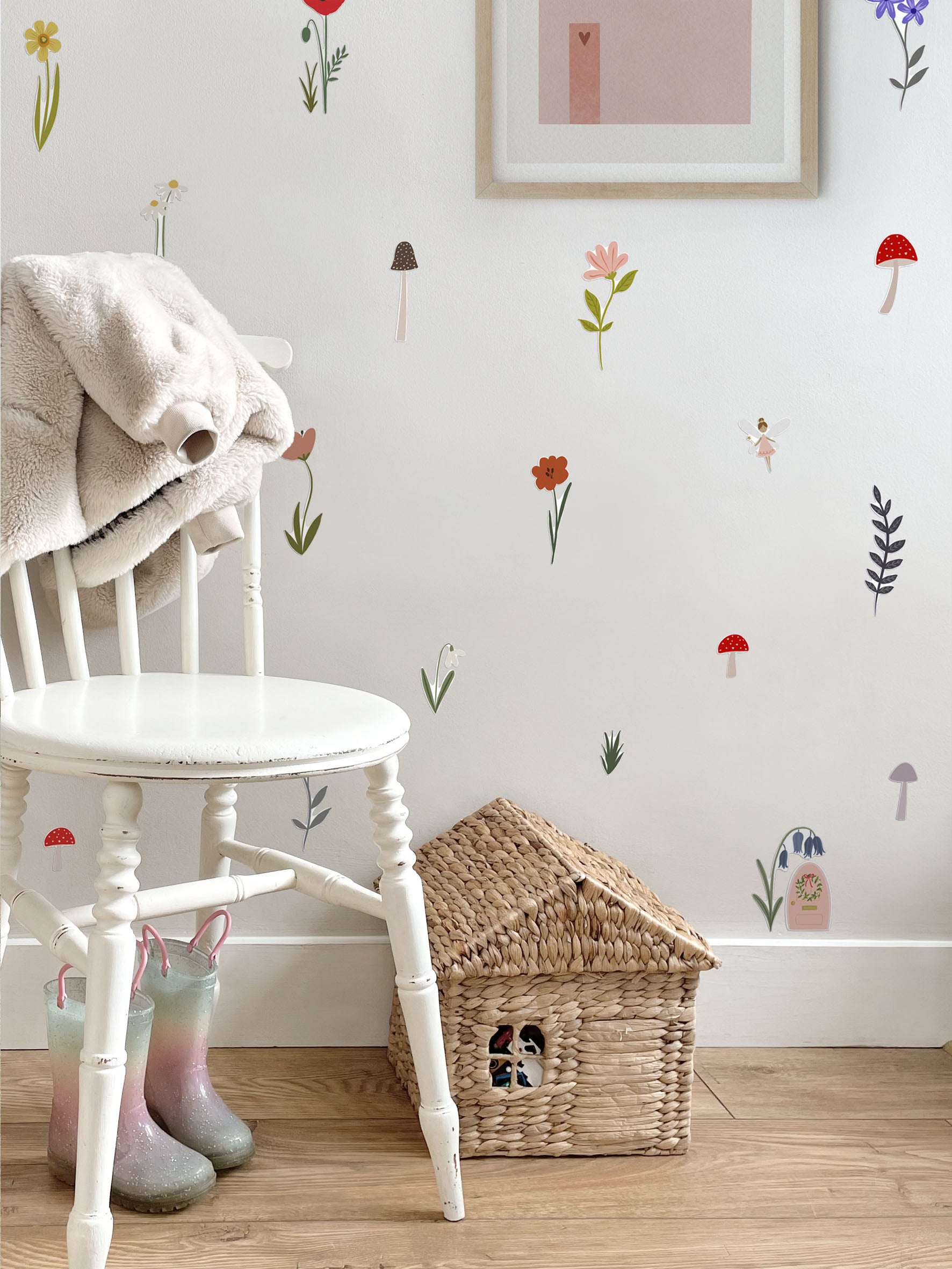Ducks In A Row Fairy Door and Forest Flower Fabric Wall stickers in girls bedroom with white shabby chic chair, glittery girls wellies and house storage basket