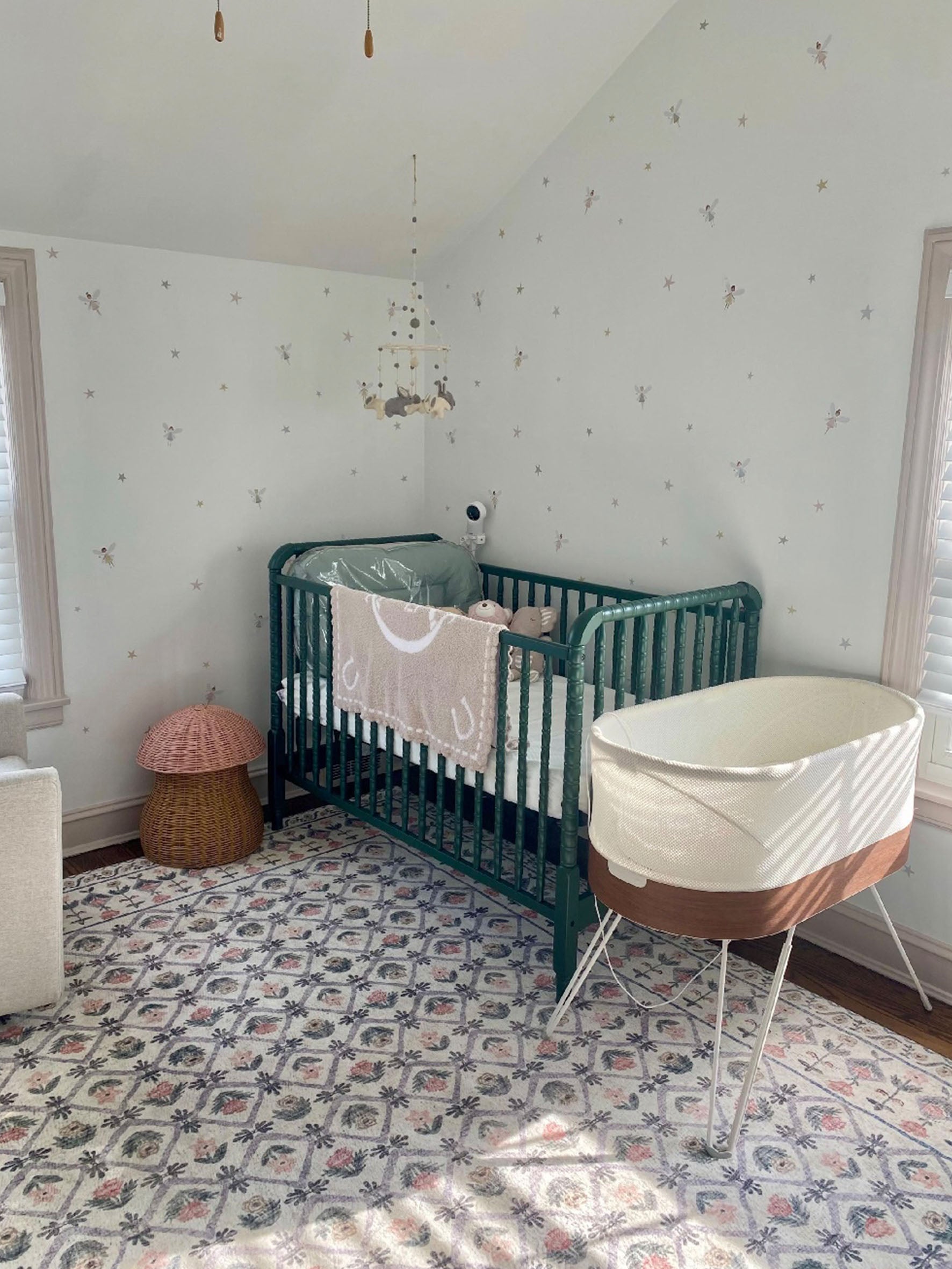 Fairy and Stars Wall Stickers in Scandinavian Style Baby Girl Nursery with green cot,Moses basket and patterned rug
