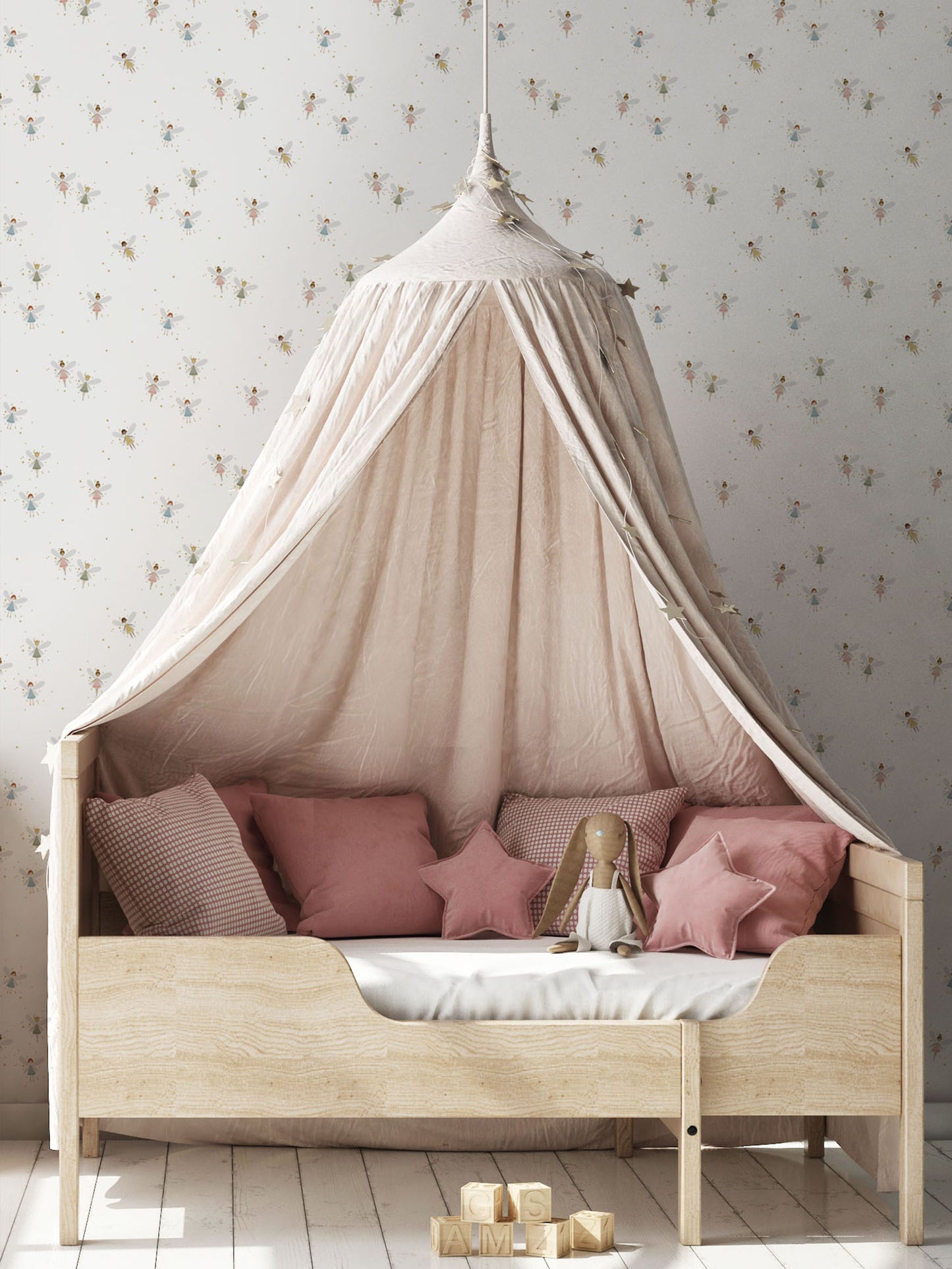 Girls bedroom with canopy over pine bed, cushions, Fairy Dust luxury children's wallpaper